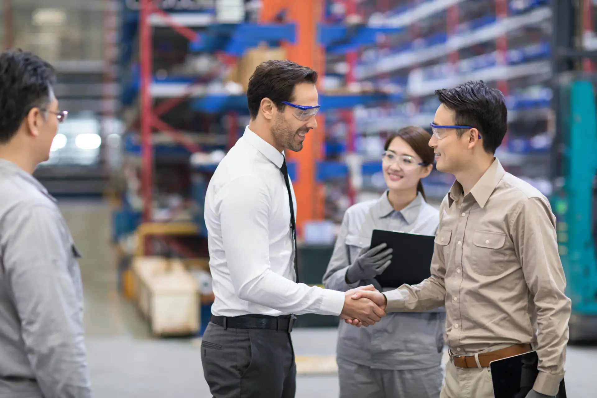 businessman-and-engineer-shaking-hands-in-the-fact-2026-01-05-05-24-28-utc